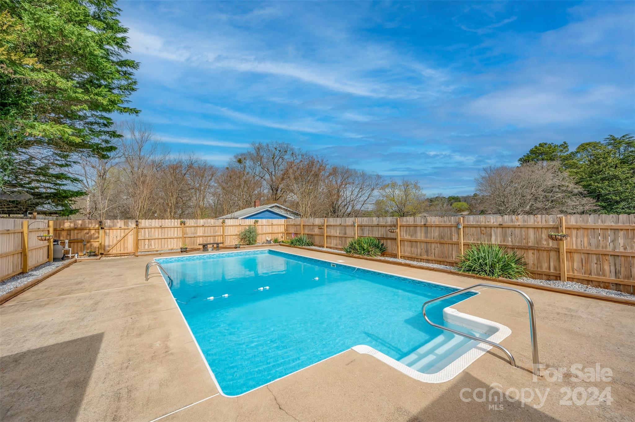 207 Smith Grove Road Forest City, NC 28043 - Photo 26 of 37 a view of a swimming pool with a lounge chair
