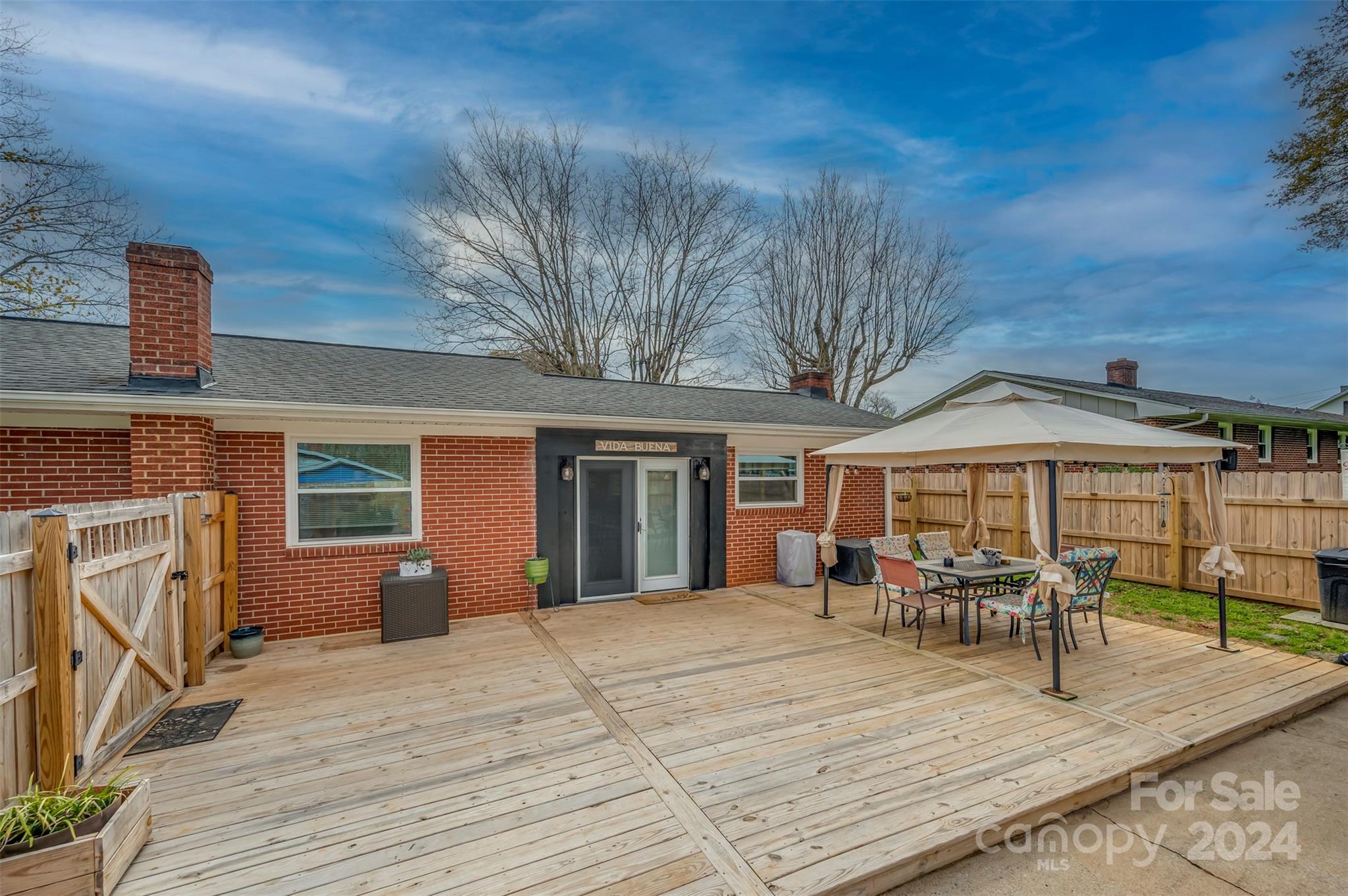 207 Smith Grove Road Forest City, NC 28043 - Photo 28 of 37 a view of a dinning table and chairs in patio of the house
