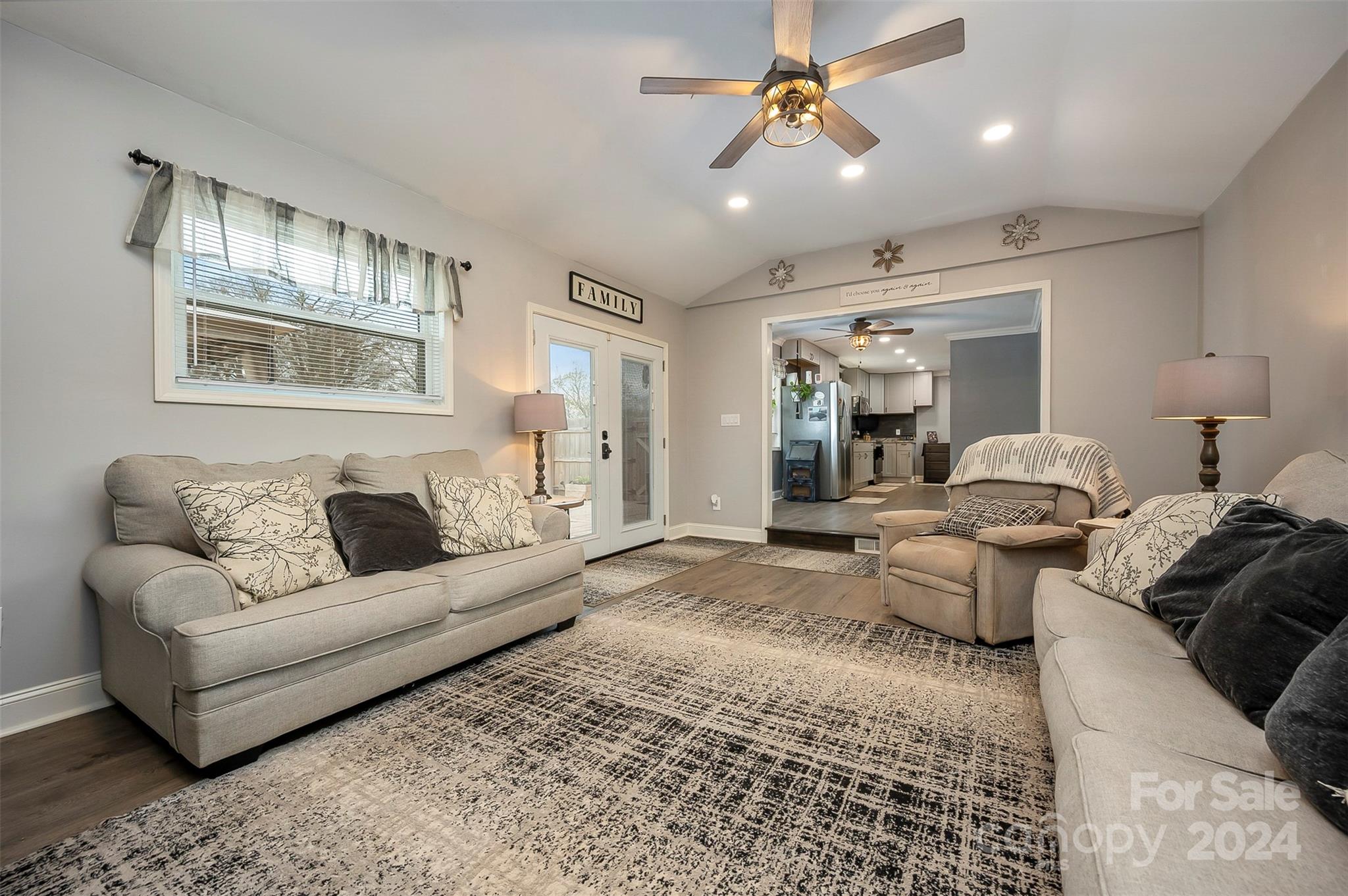 207 Smith Grove Road Forest City, NC 28043 - Photo 6 of 37 a living room with furniture and a chandelier