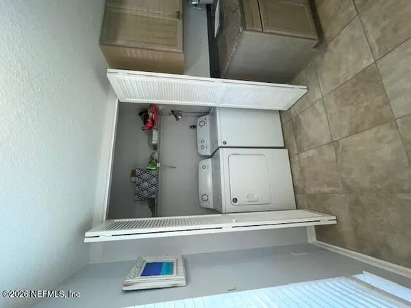 a view of entryway with a front door