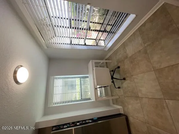 a bathroom with a bathtub and shower