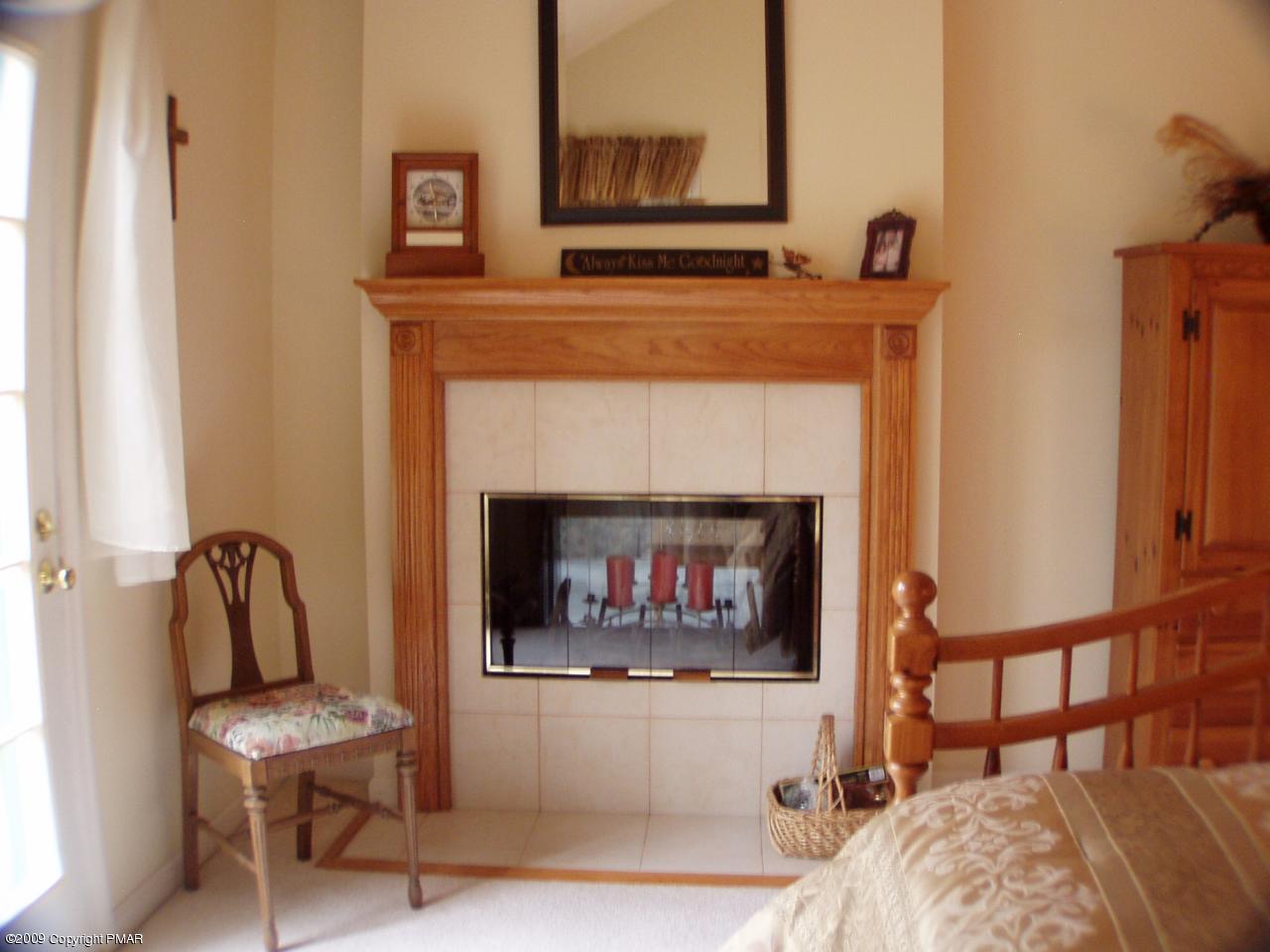 Devil's Hole Road Cresco, PA 18326 - Photo 15 of 27 a living room with furniture and a fireplace