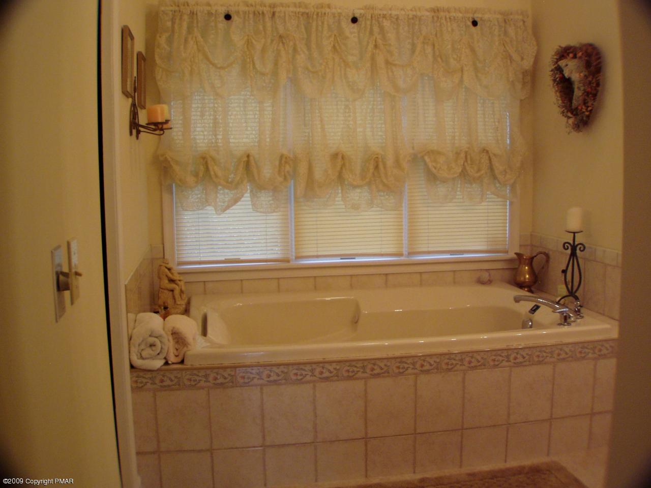 Devil's Hole Road Cresco, PA 18326 - Photo 17 of 27 a bathroom with a bathtub and shower