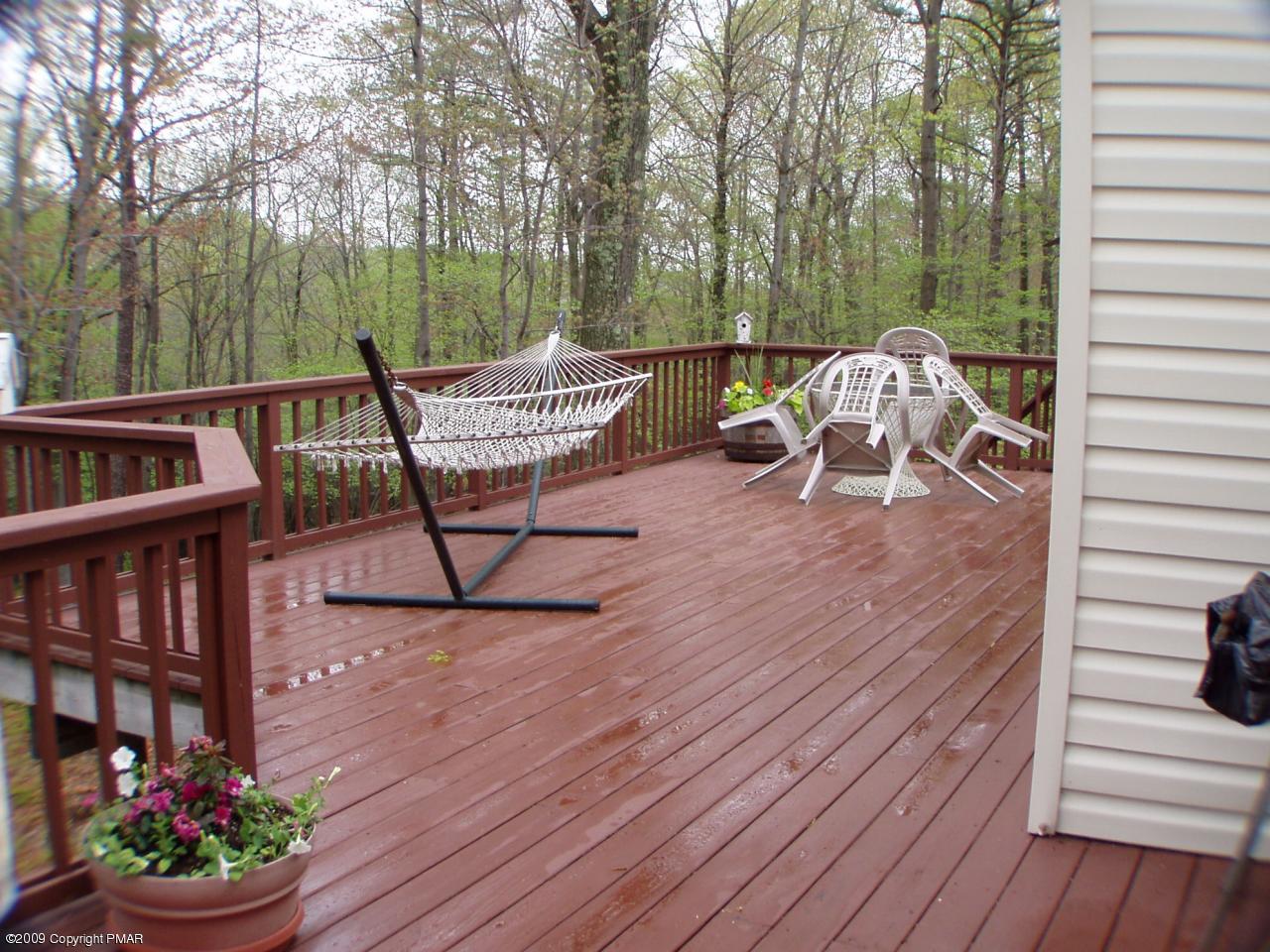 Devil's Hole Road Cresco, PA 18326 - Photo 18 of 27 a view of a chair and tables in the balcony