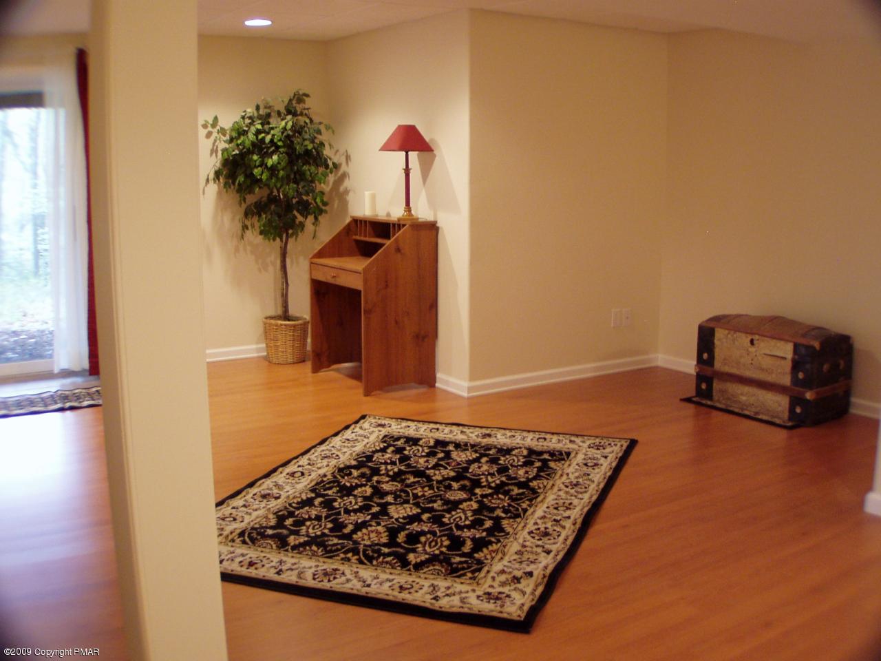 Devil's Hole Road Cresco, PA 18326 - Photo 21 of 27 a living room with furniture and a couch