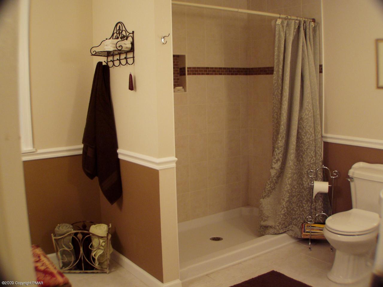 Devil's Hole Road Cresco, PA 18326 - Photo 23 of 27 a bathroom with a shower and a toilet