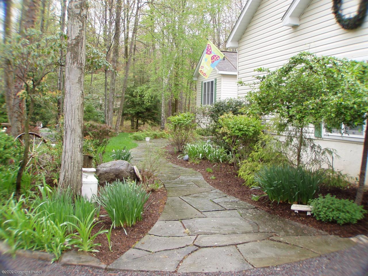 Devil's Hole Road Cresco, PA 18326 - Photo 3 of 27 a view of a garden with potted plants