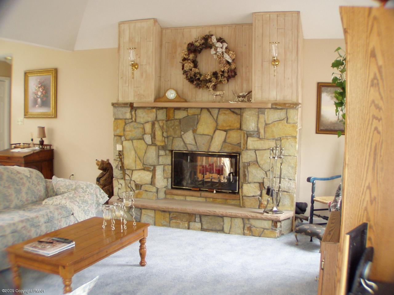 Devil's Hole Road Cresco, PA 18326 - Photo 7 of 27 a living room with furniture and a fireplace