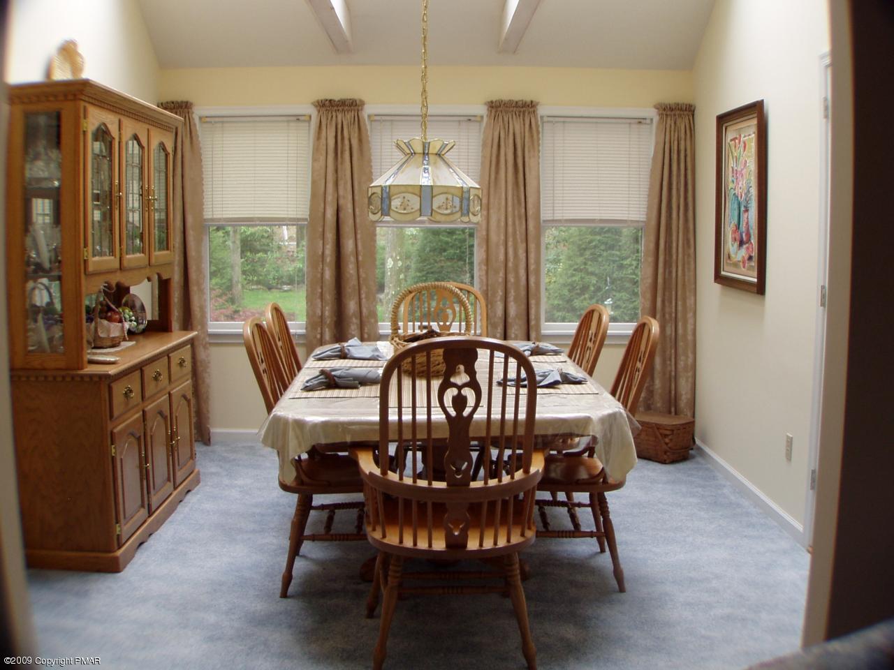 Devil's Hole Road Cresco, PA 18326 - Photo 8 of 27 a view of a dining room with furniture window and outside view