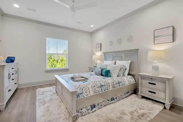 a bedroom with a bed and a dresser