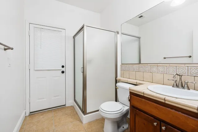 a view of a storage & utility room with a window