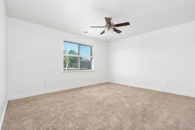 a bathroom with a bathtub sink and mirror