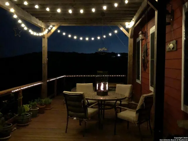 a view of a dirt road with a building in the background