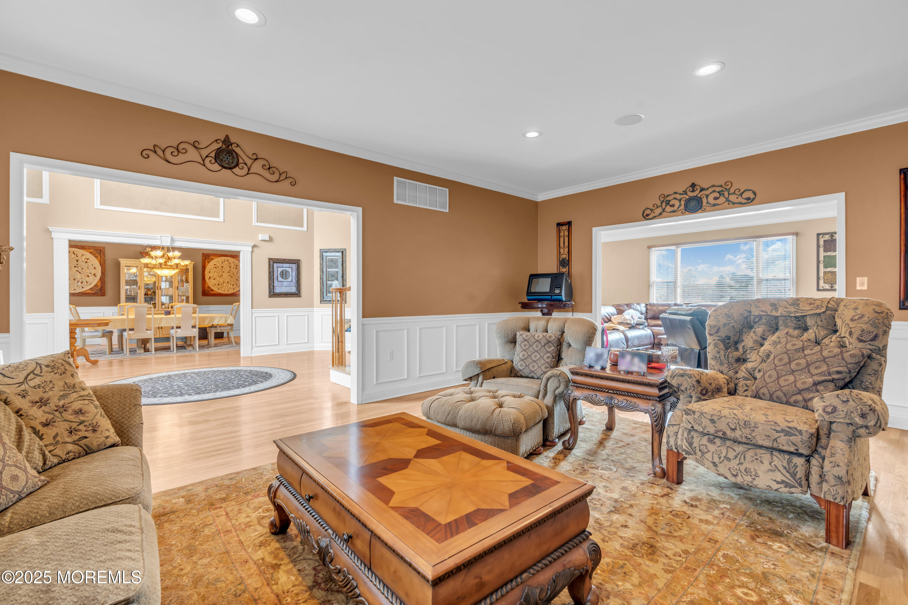 168 Pleasant Valley Road Morganville, NJ 07751 - Photo 8 of 61 a living room with furniture and a table