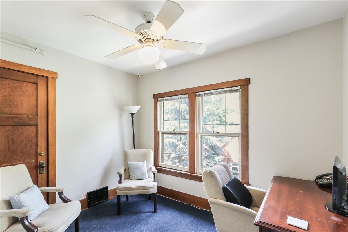 124 Harrison Street Barrington, IL 60010 - Photo 22 of 33 a living room with furniture and a large window