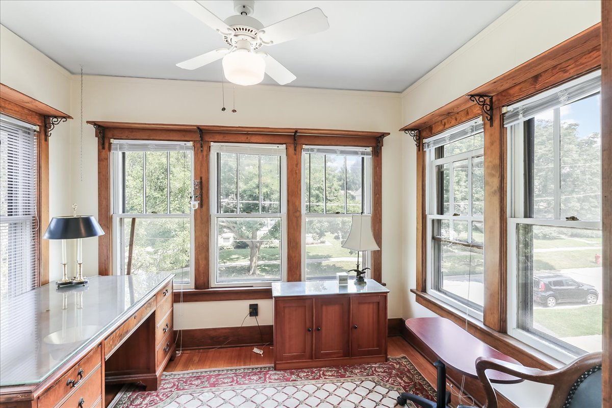 124 Harrison Street Barrington, IL 60010 - Photo 26 of 33 a room with a large window and furniture