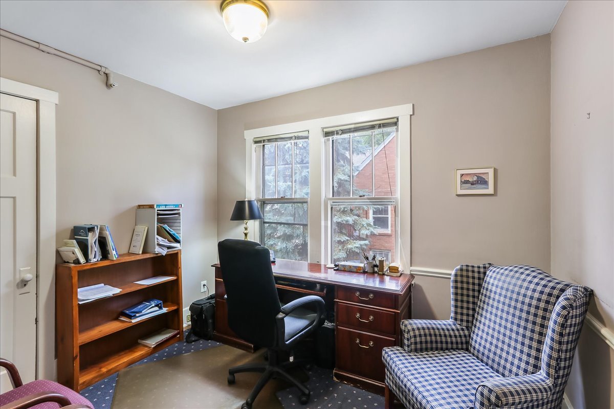 124 Harrison Street Barrington, IL 60010 - Photo 8 of 33 a view of a workspace with furniture and a window