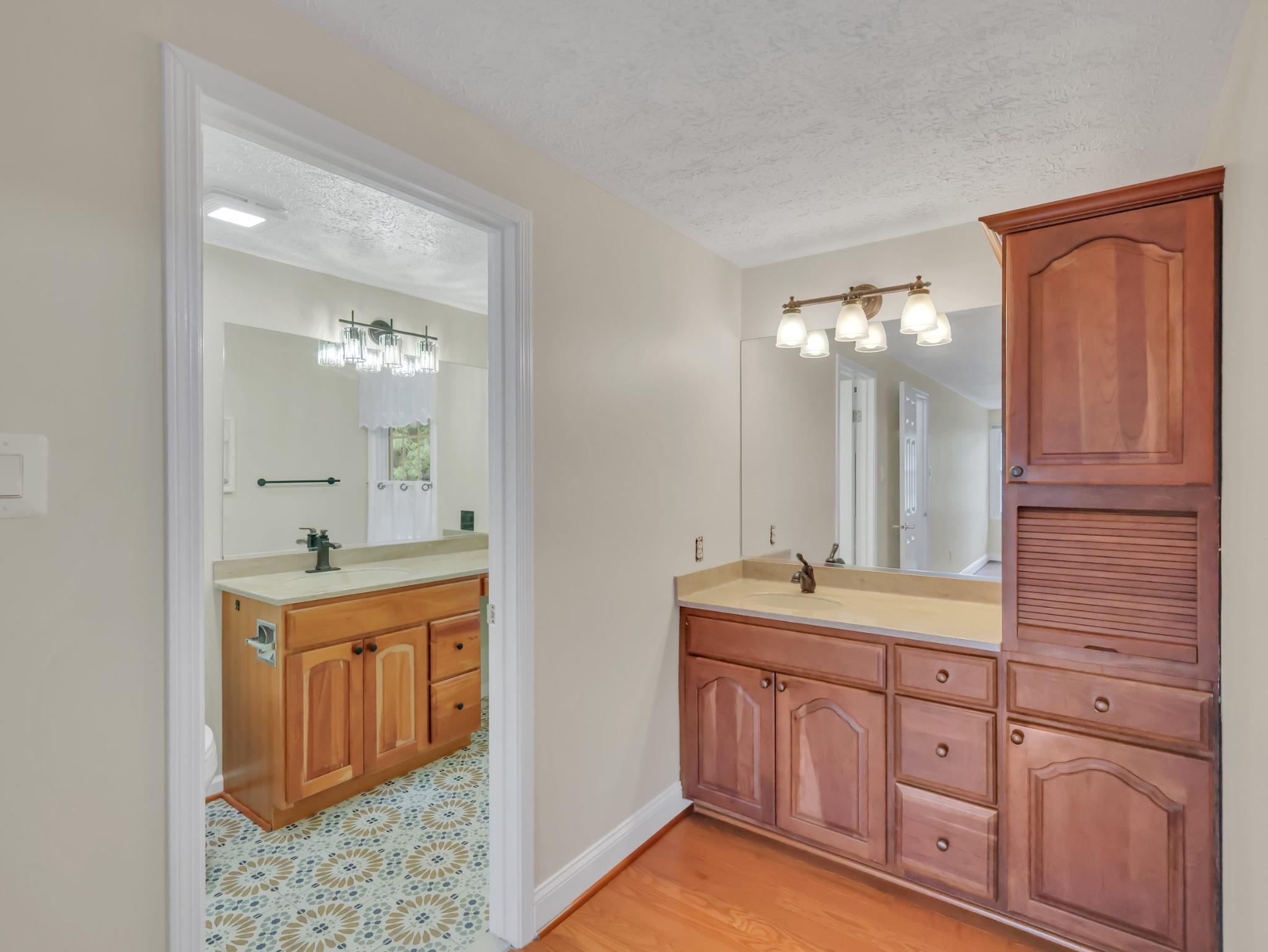 18 Windmill Court Silver Spring, MD 20905 - Photo 26 of 37 Main bedroom Elegant dual vanity bathroom space.