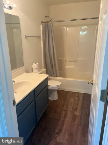 an empty room with a fireplace