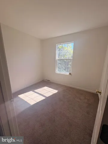 a view of a room with stairs