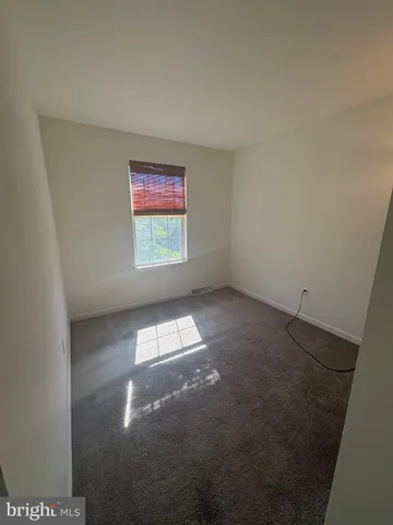 a view of a room with an empty space