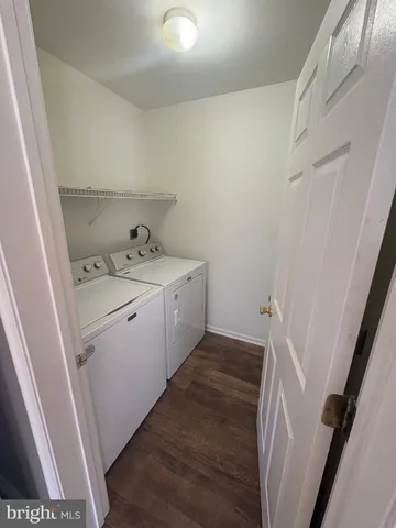 en empty room with wooden floor