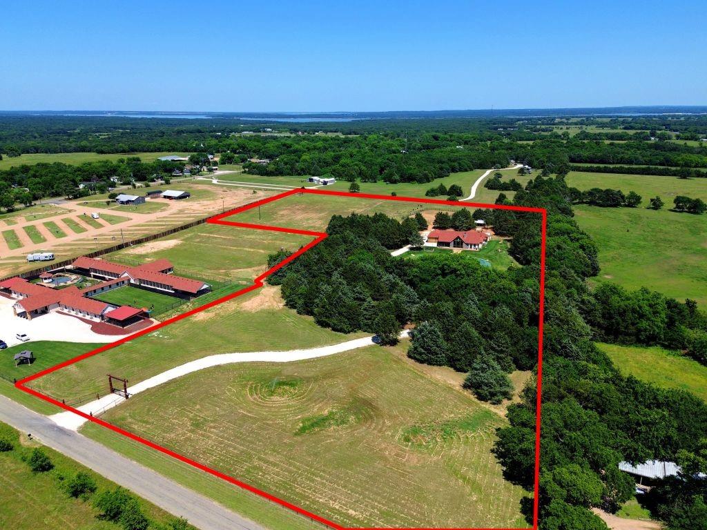 180 East Greer Road Sadler, TX 76264 - Photo 40 of 40 a view of a tennis ground with a large pool