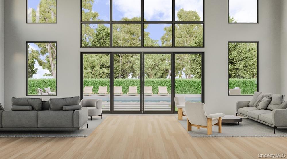 Tbb Dock Row Road East Moriches, NY 11940 - Photo 6 of 7 a living room with furniture and a large window