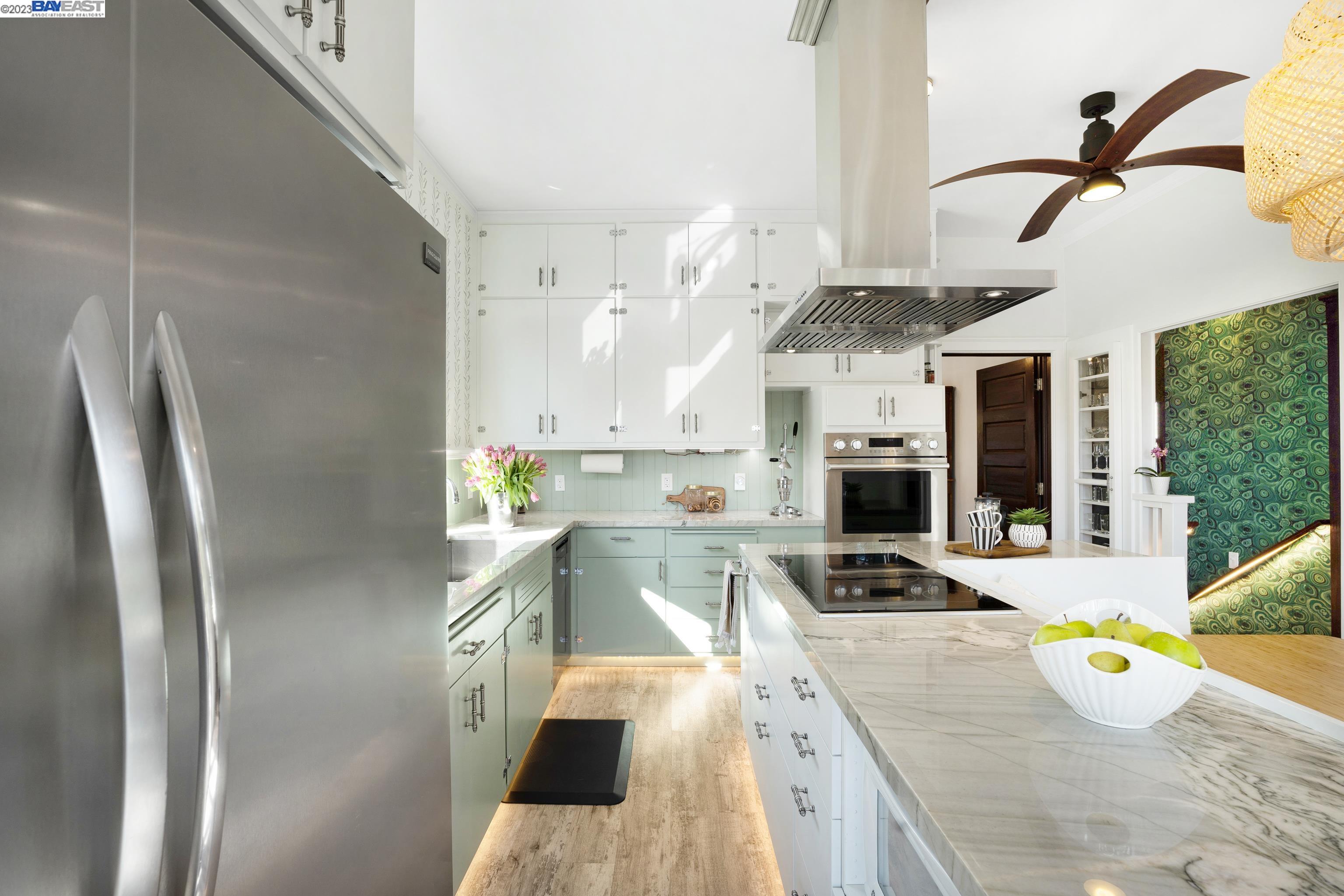 Undisclosed Address Alameda, CA 94501 - Photo 11 of 50 a kitchen with stainless steel appliances granite countertop a sink a stove and a refrigerator