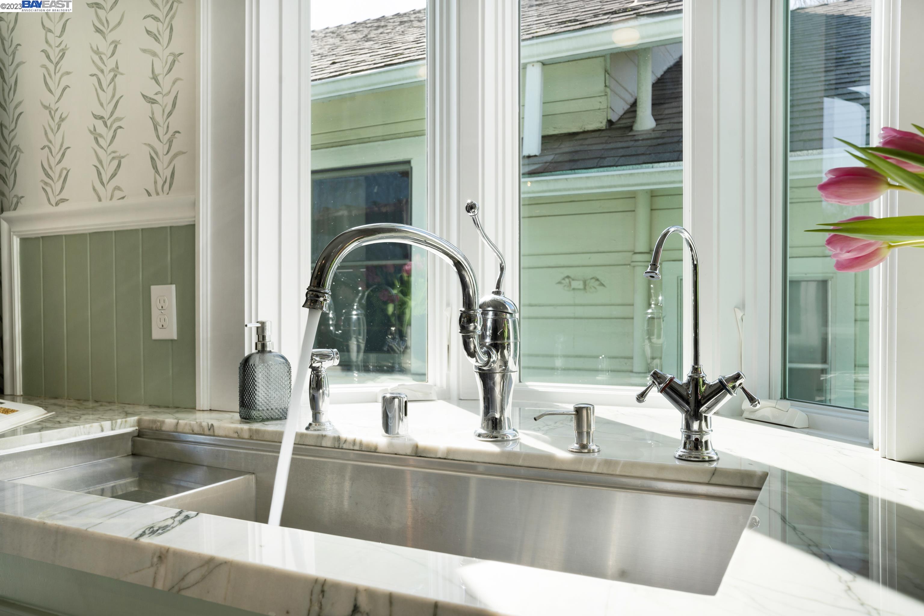 Undisclosed Address Alameda, CA 94501 - Photo 13 of 50 a kitchen with sink and mirror