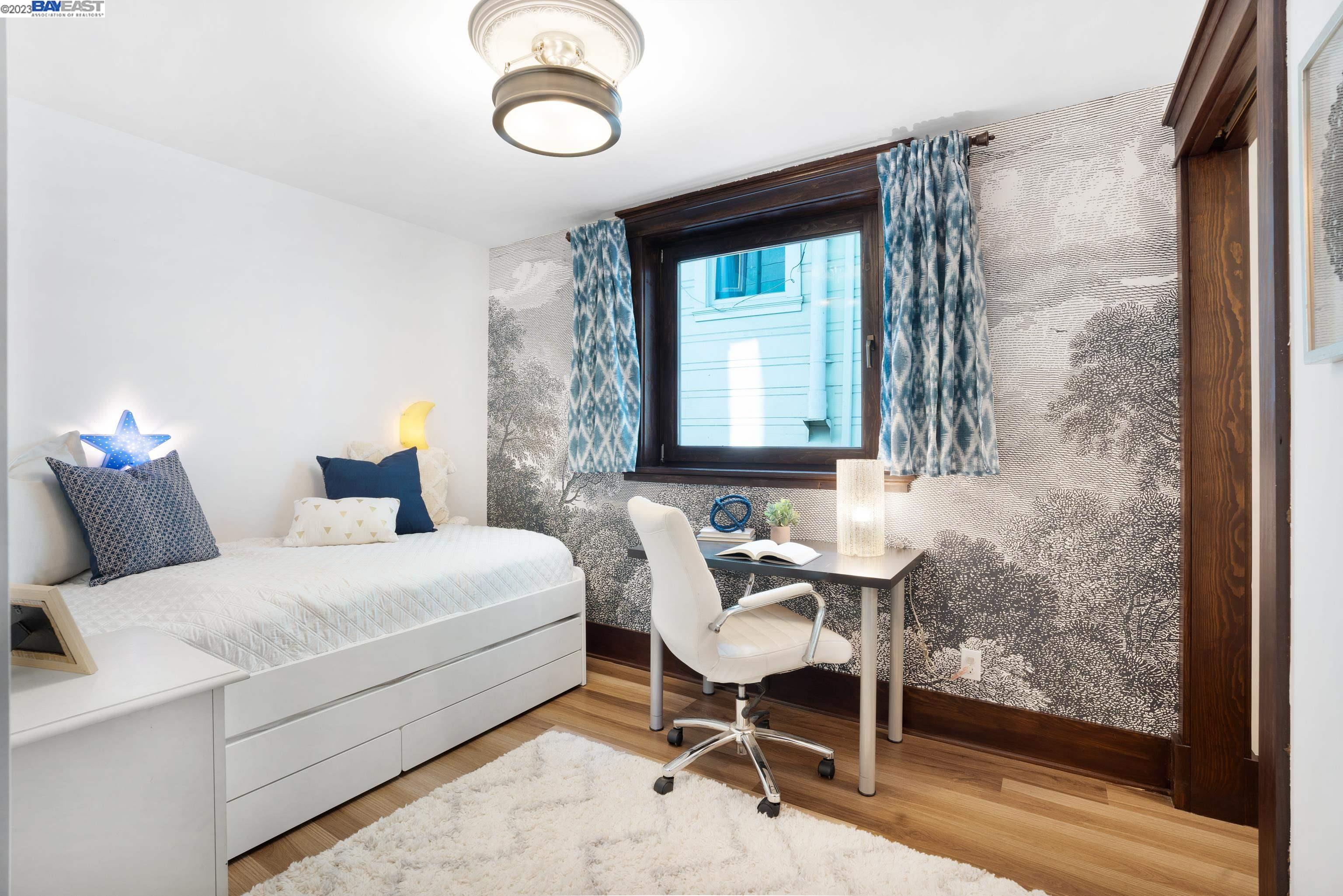 Undisclosed Address Alameda, CA 94501 - Photo 23 of 50 a bedroom with a bed and a window