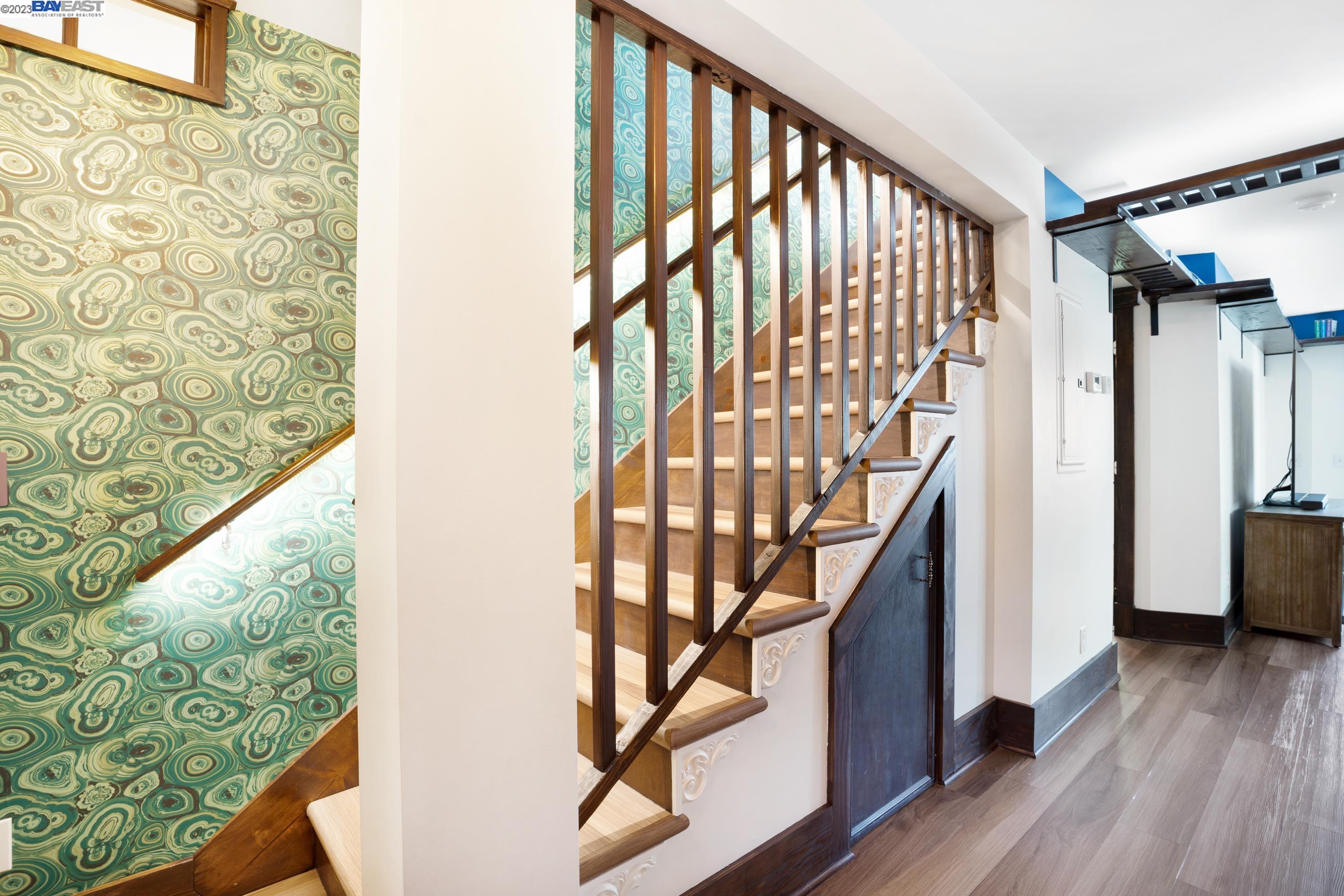 Undisclosed Address Alameda, CA 94501 - Photo 24 of 50 a view of entryway with wooden floor and stairs