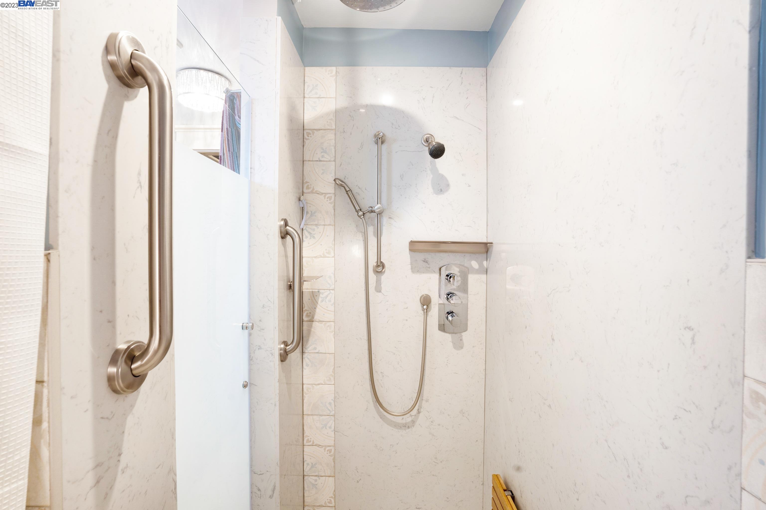 Undisclosed Address Alameda, CA 94501 - Photo 30 of 50 a bathroom with a glass shower door