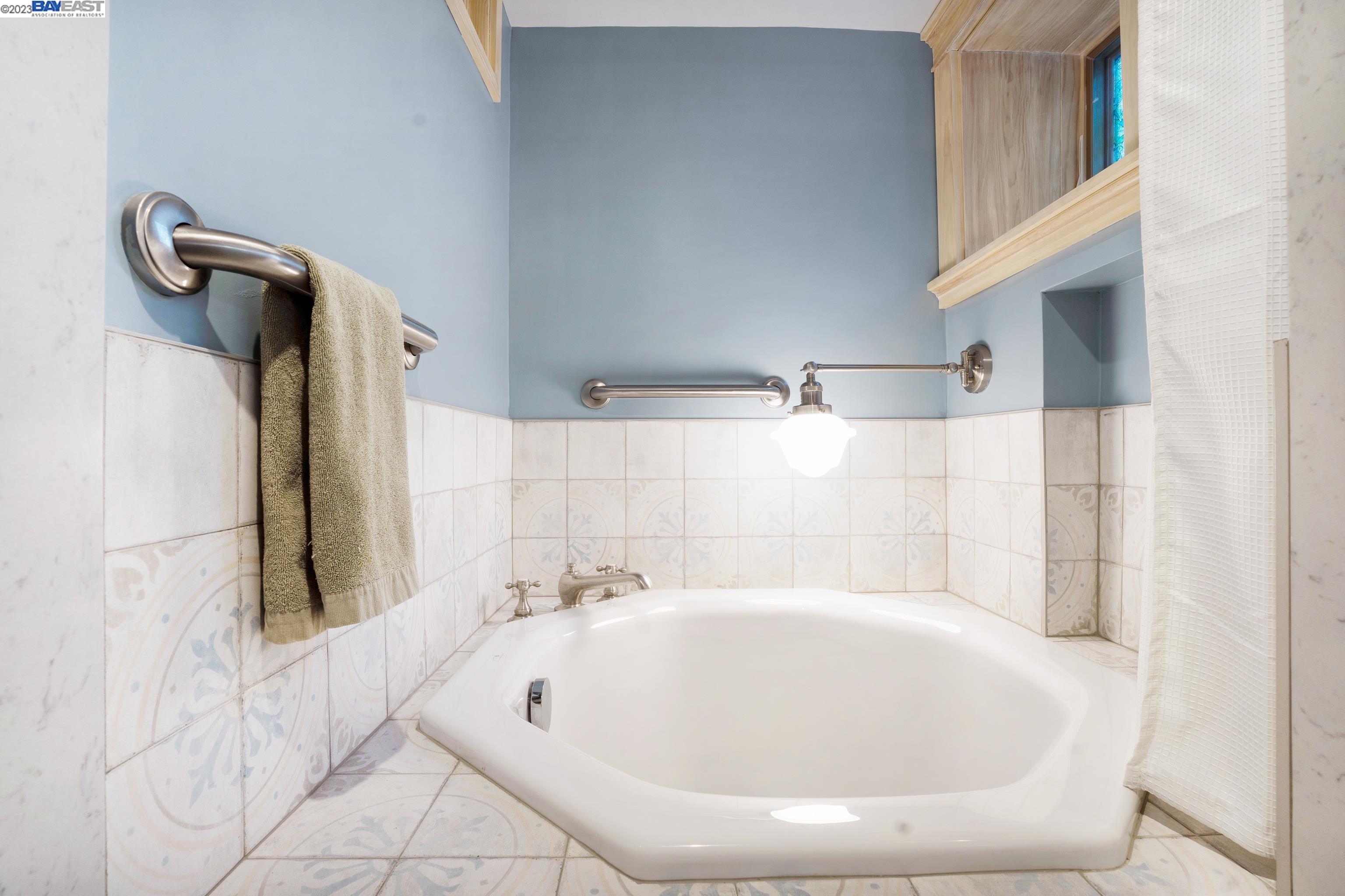 Undisclosed Address Alameda, CA 94501 - Photo 31 of 50 a bathroom with a white tub