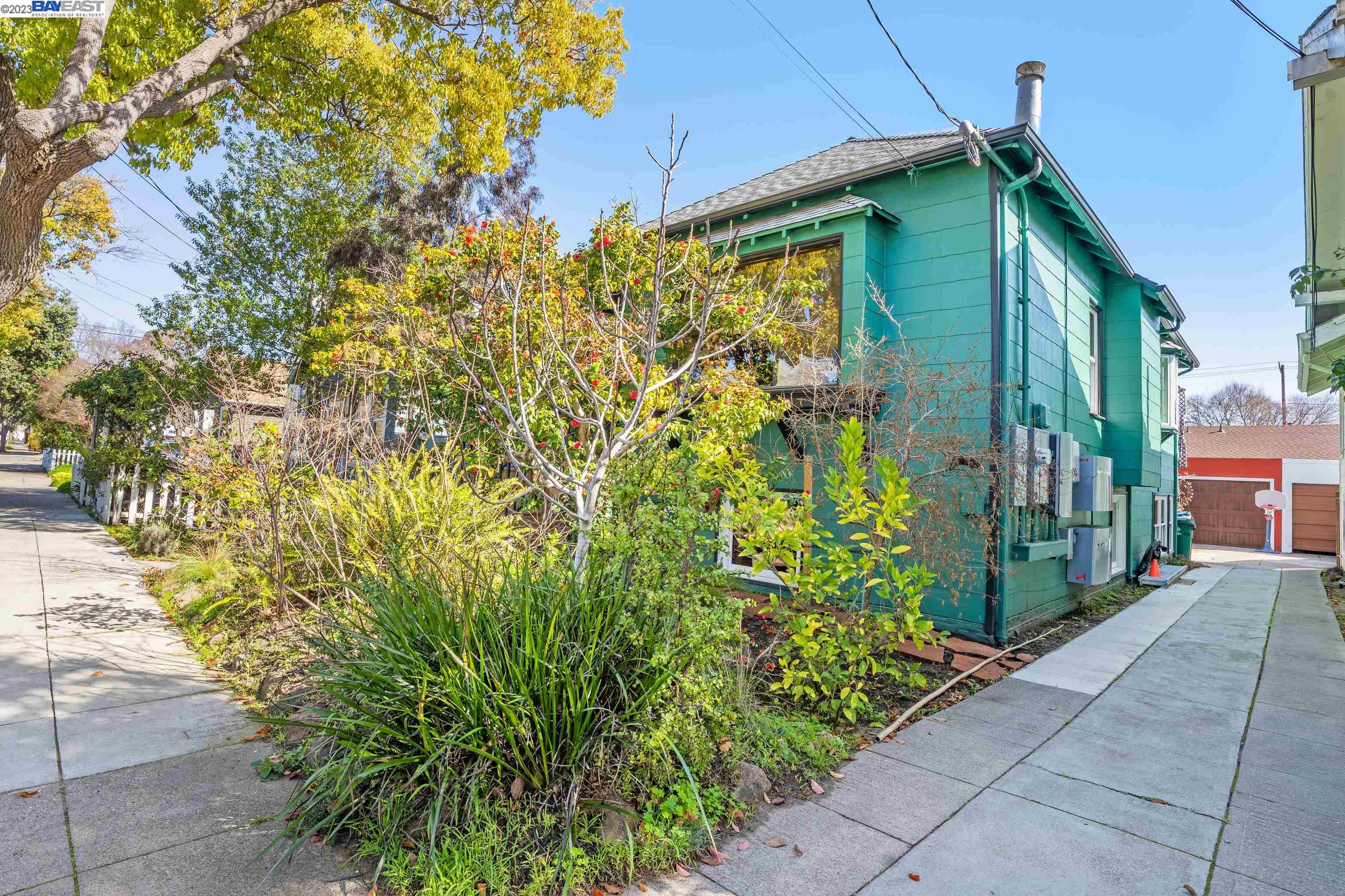Undisclosed Address Alameda, CA 94501 - Photo 46 of 50 a front view of a house with a yard
