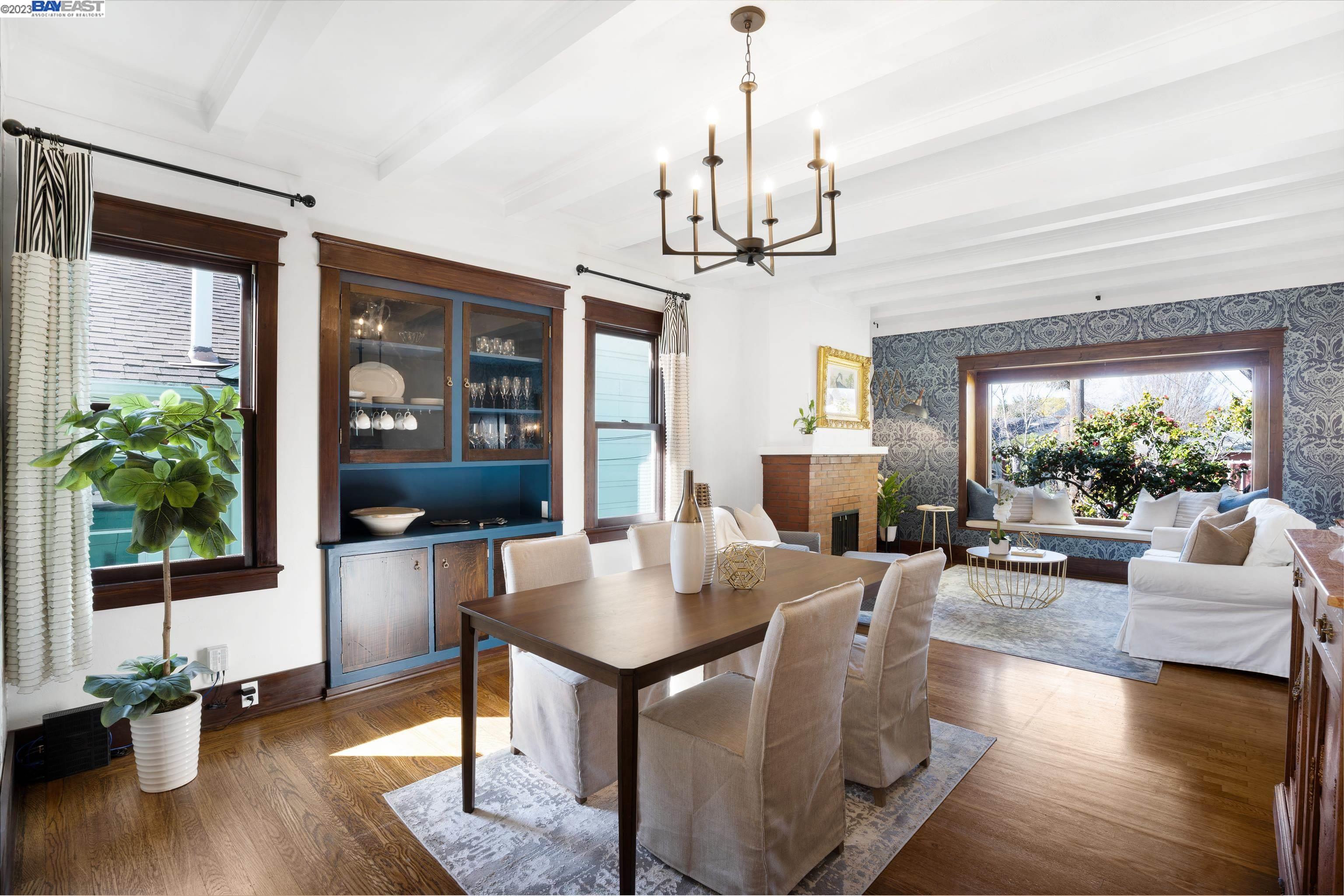 Undisclosed Address Alameda, CA 94501 - Photo 5 of 50 a living room with furniture and a chandelier