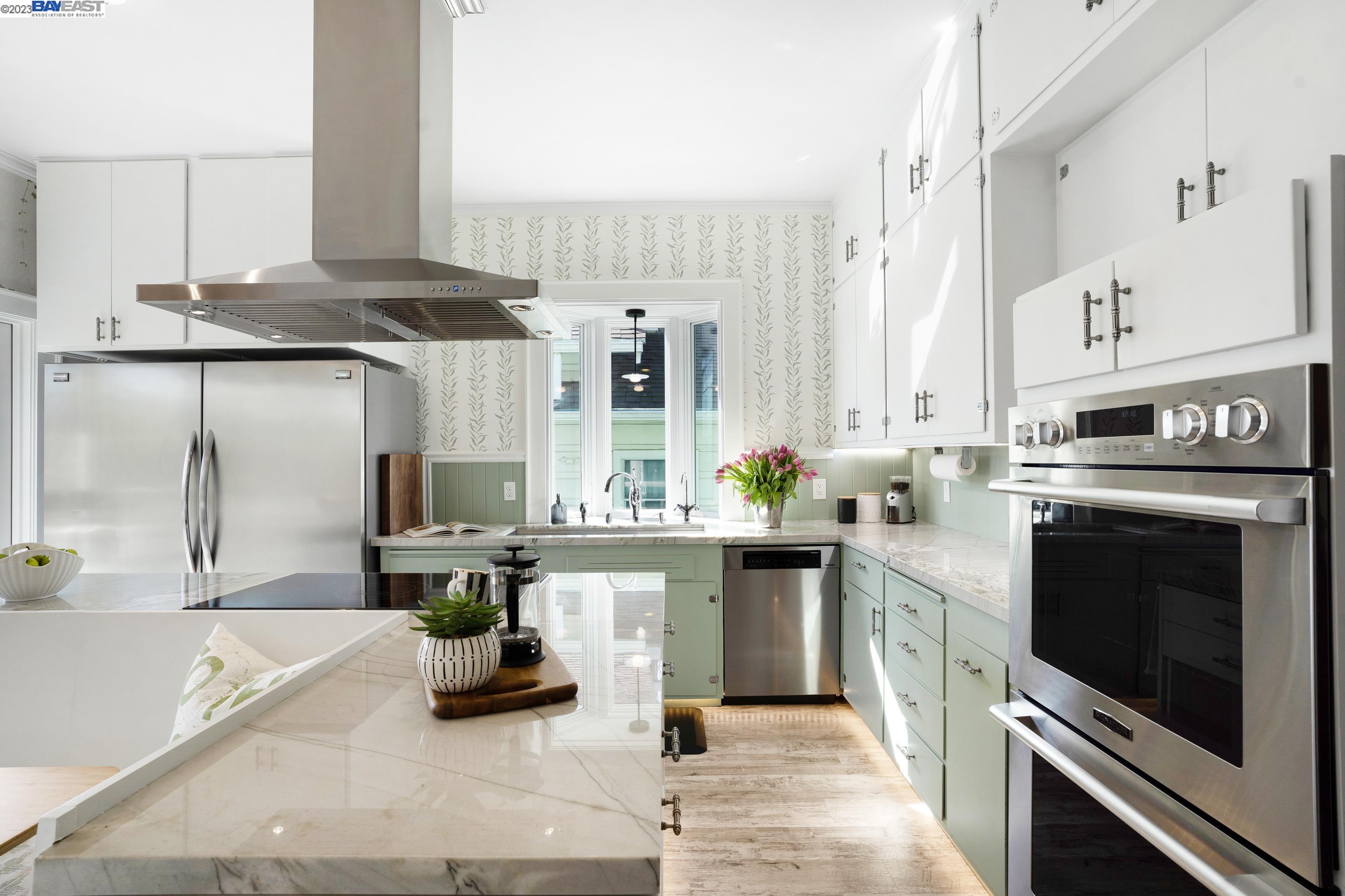 Undisclosed Address Alameda, CA 94501 - Photo 9 of 50 a kitchen with stainless steel appliances granite countertop a stove a sink and a refrigerator