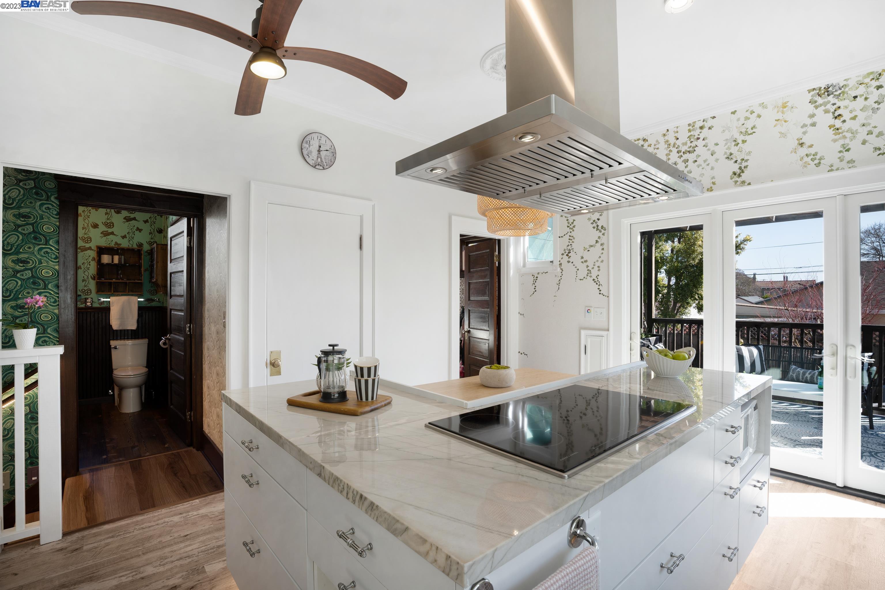 Undisclosed Address Alameda, CA 94501 - Photo 10 of 50 a kitchen with granite countertop a sink a counter space and stainless steel appliances