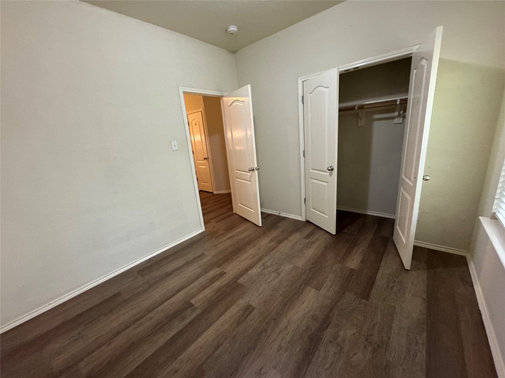 2053 Rachel Lane Round Rock, TX 78664 - Photo 20 of 37 an empty room with wooden floor and closet