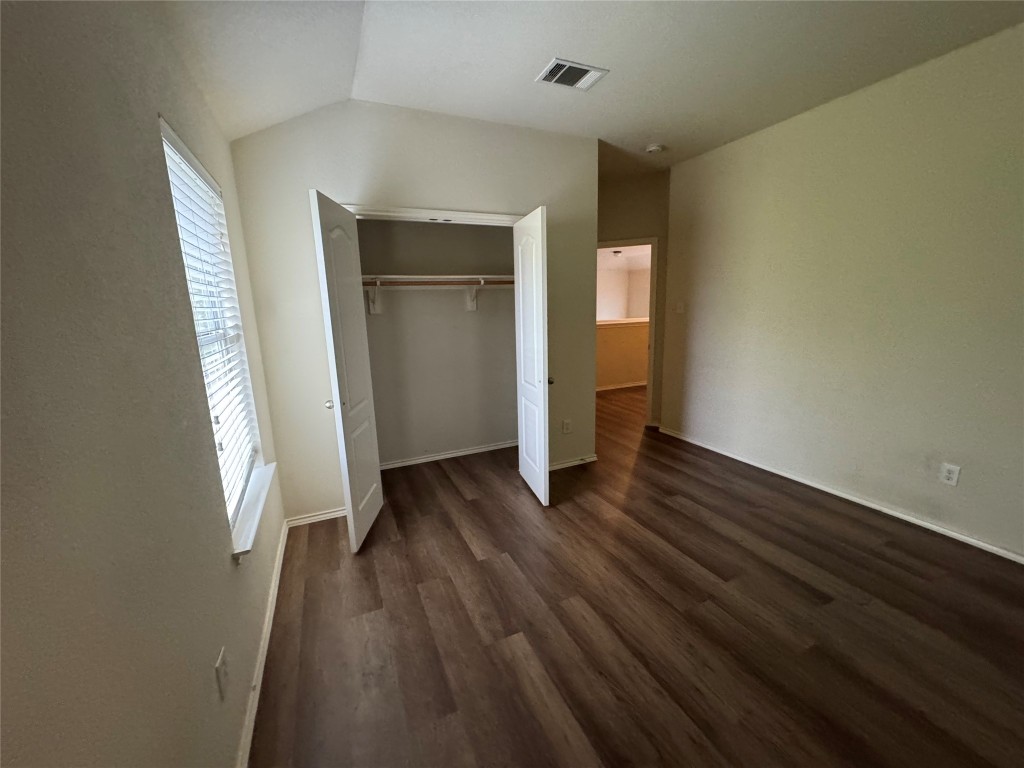 2053 Rachel Lane Round Rock, TX 78664 - Photo 22 of 37 an empty room with wooden floor and closet