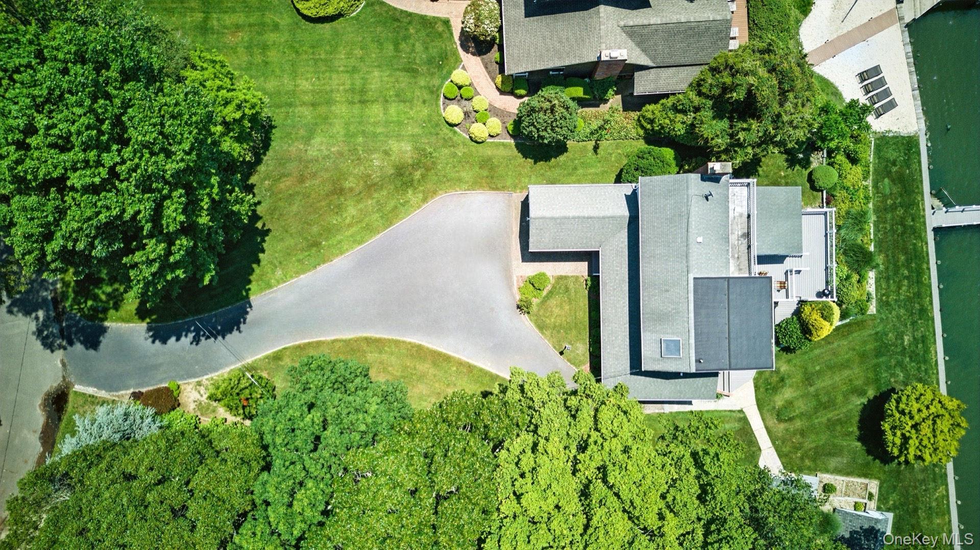 2005 Westview Drive Mattituck, NY 11952 - Photo 7 of 45 an aerial view of a house with a garden