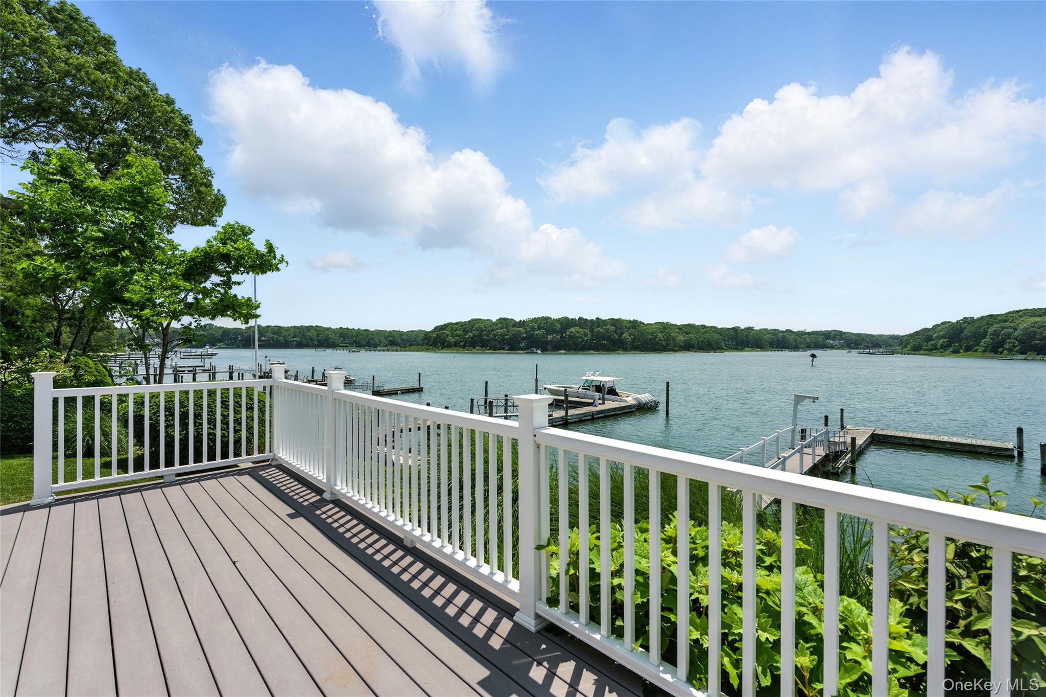 2005 Westview Drive Mattituck, NY 11952 - Photo 8 of 45 a view of a balcony with wooden floor and fence