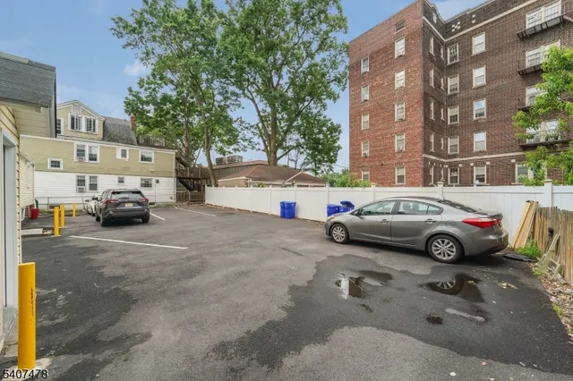 a view of parking with cars parked