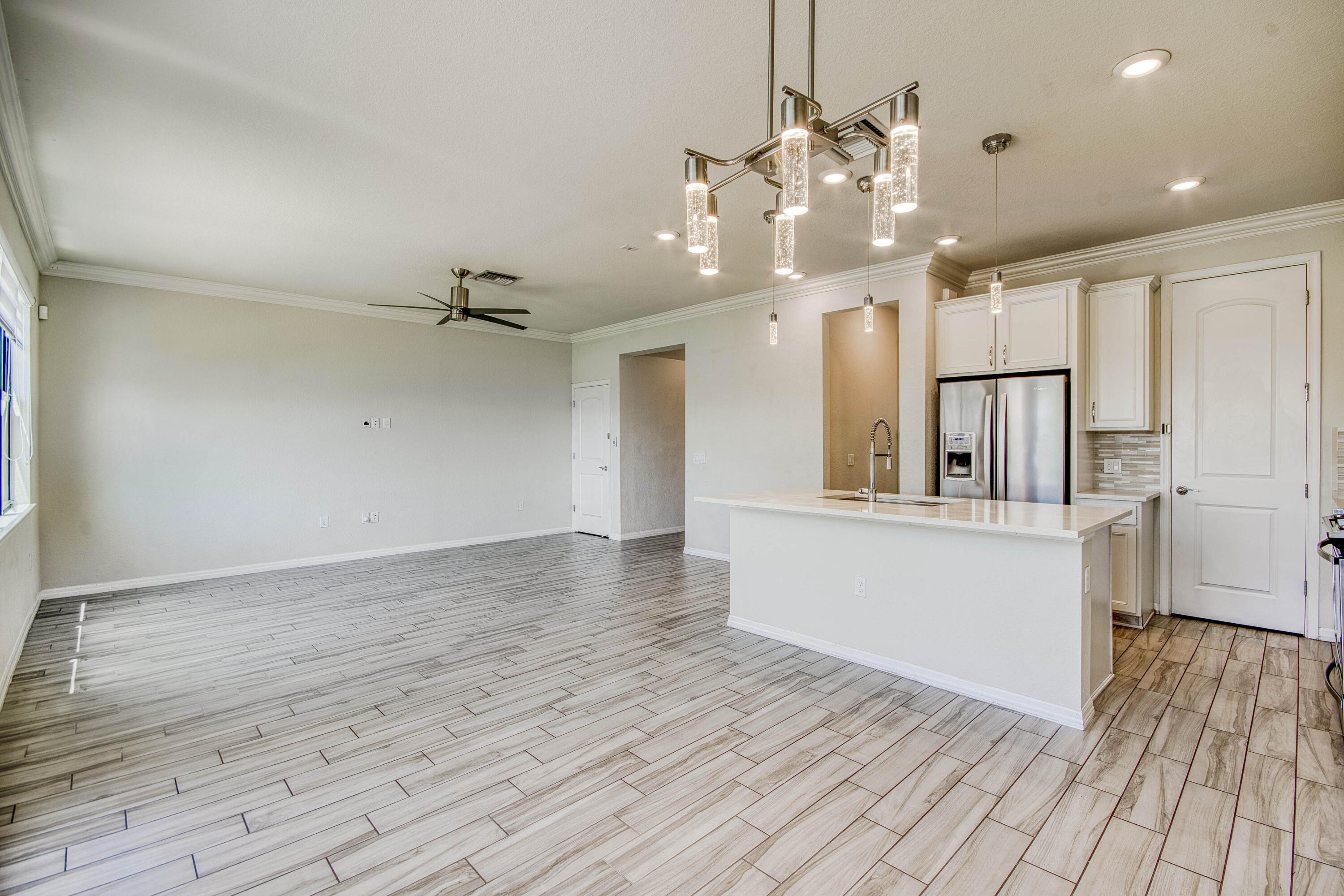 8301 Rearing Lane Lake Worth, FL 33467 - Photo 18 of 33 a view of a kitchen with wooden floor