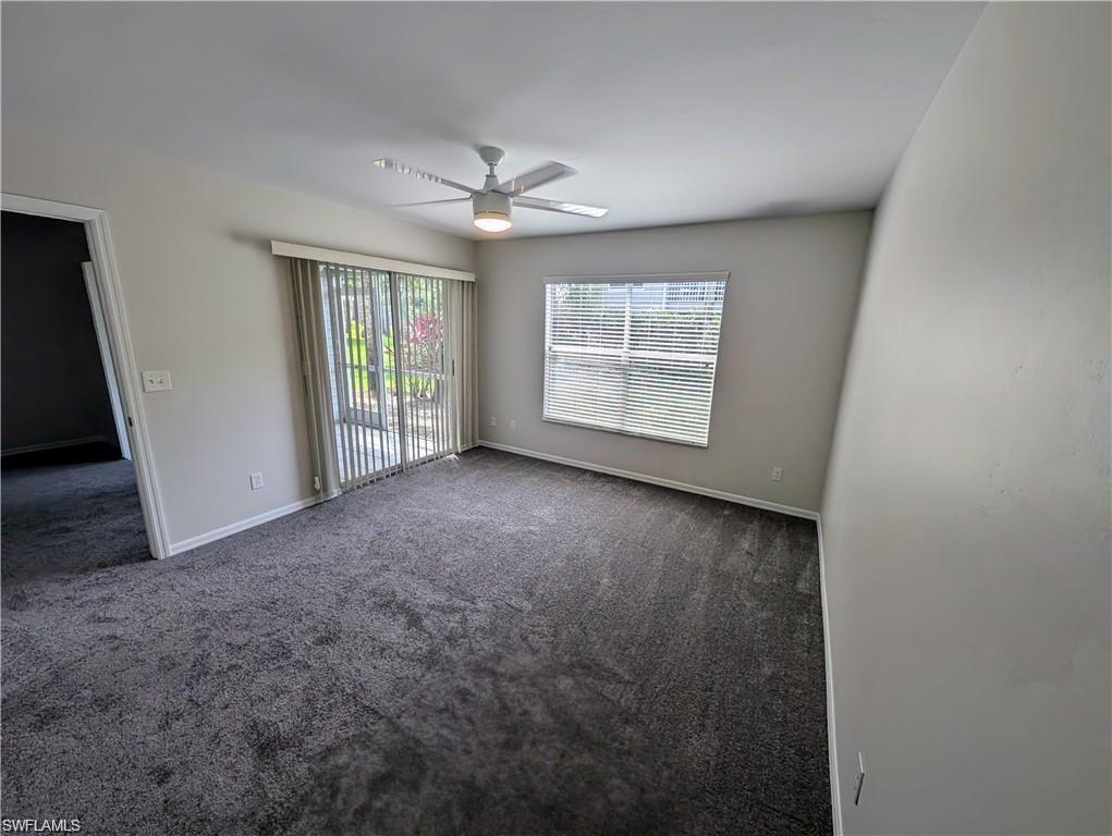 1915 Courtyard Way, Unit G102 Naples, FL 34112 - Photo 5 of 16 Primary bedroom has direct access to backyard