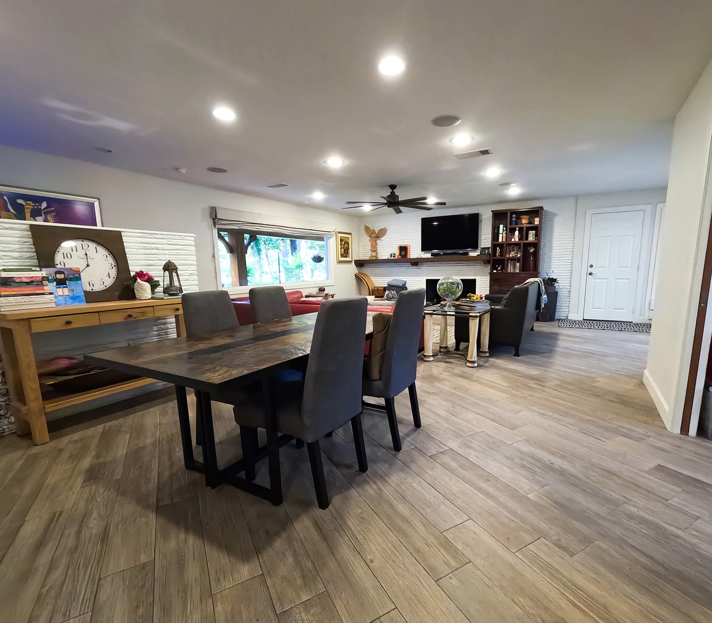 9818 Shadow Wood Drive Houston, TX 77080 - Photo 11 of 36 a view of a dining room with furniture and wooden floor