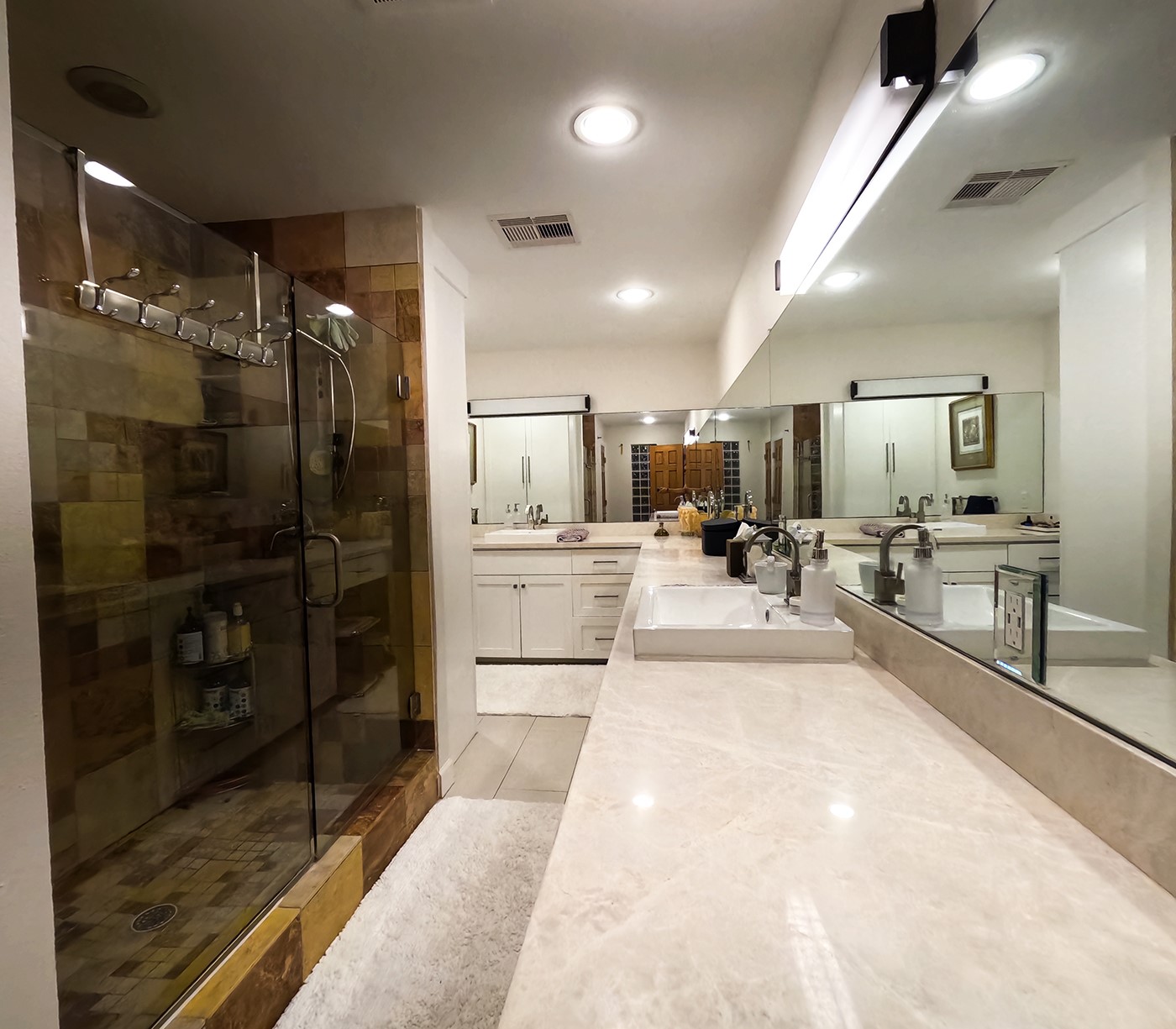 9818 Shadow Wood Drive Houston, TX 77080 - Photo 16 of 36 a large white room with glass door and chandelier