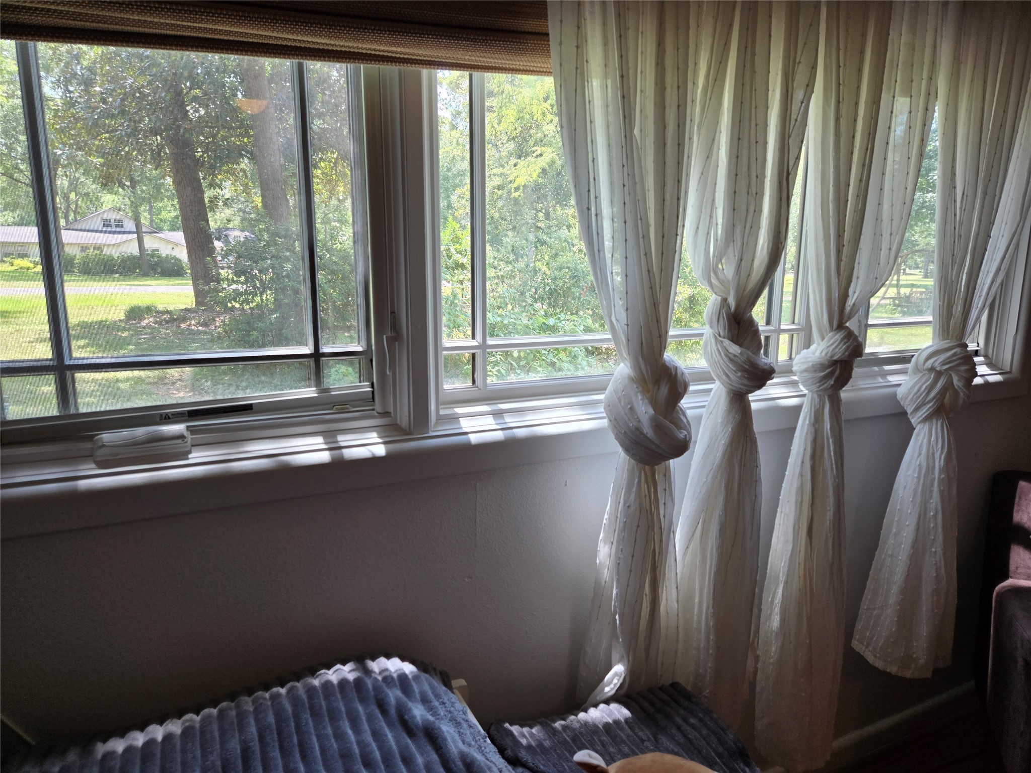 9818 Shadow Wood Drive Houston, TX 77080 - Photo 19 of 36 a view of balcony with furniture and window