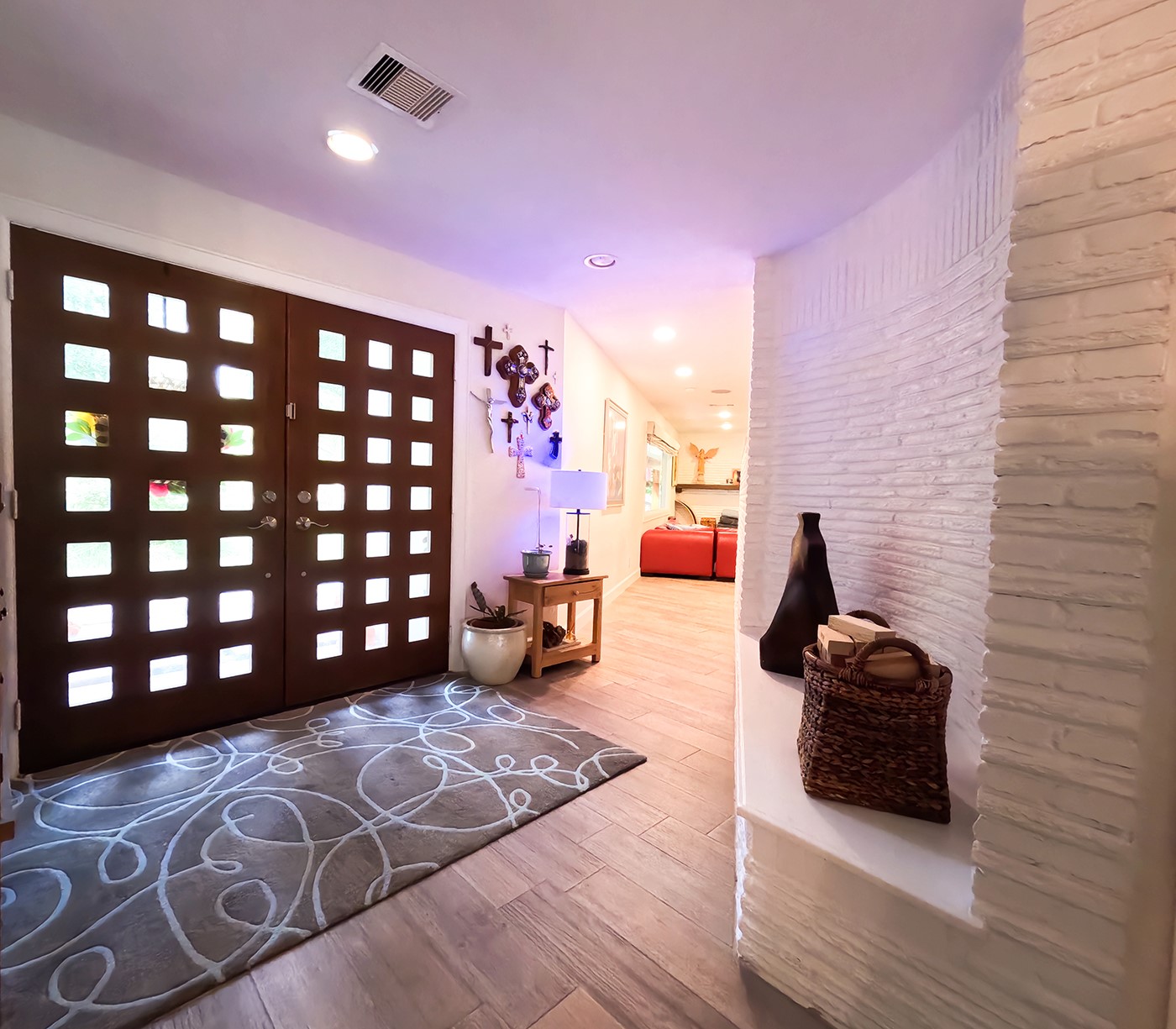 9818 Shadow Wood Drive Houston, TX 77080 - Photo 4 of 36 a bedroom with a bed and a walk in closet with wooden floor