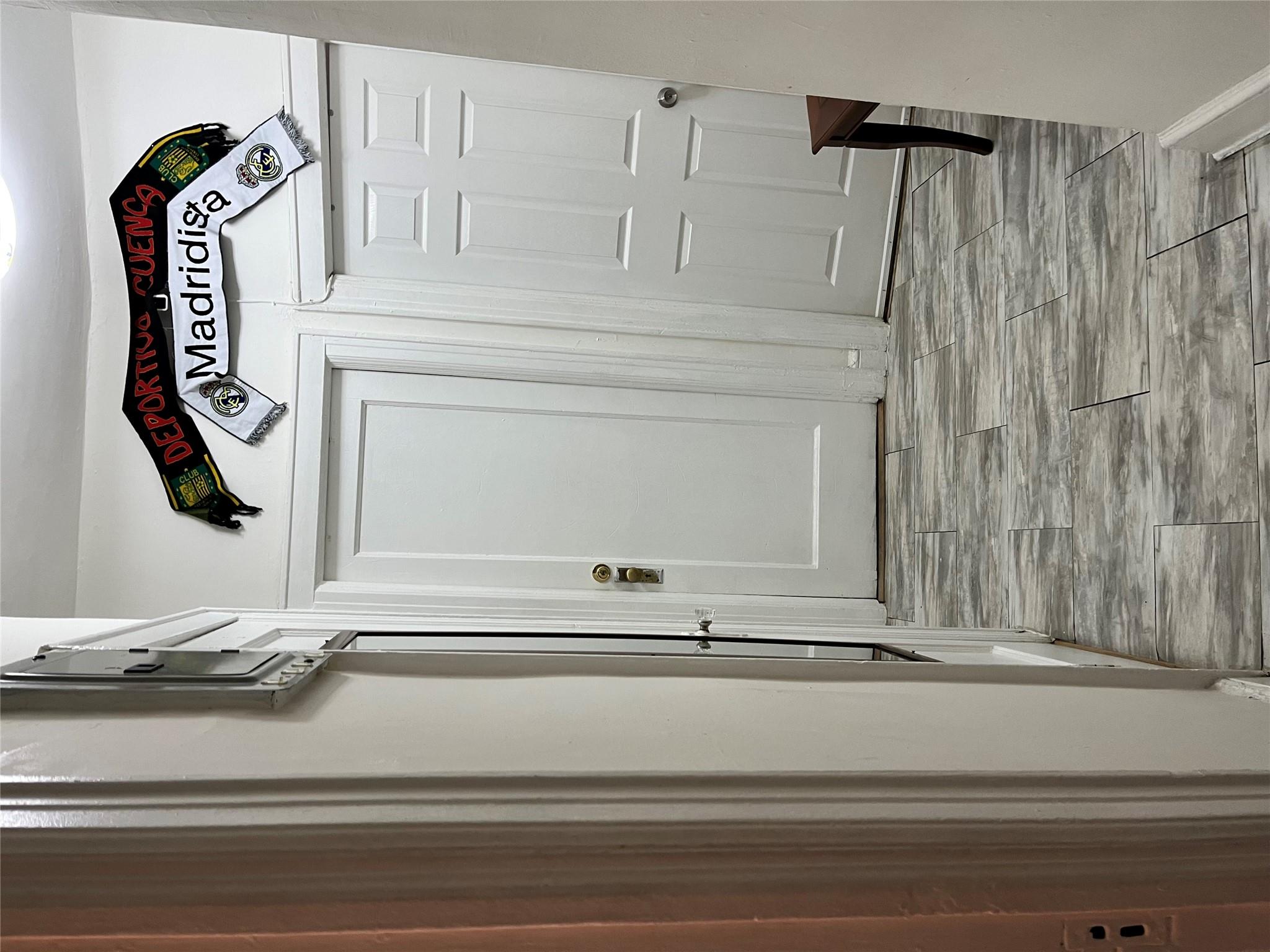 39-82 65th Place, Unit 4F Queens, NY 11377 - Photo 8 of 10 a view of a hallway